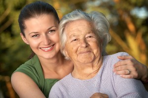 Senior Woman and granddaughter, smiles